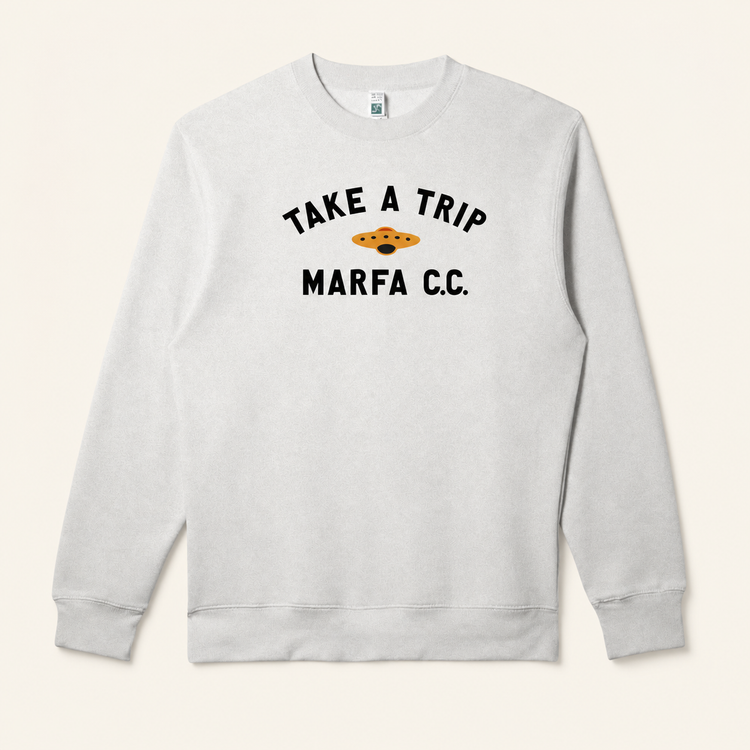 Light grey Take a Trip crewneck on warm beige background